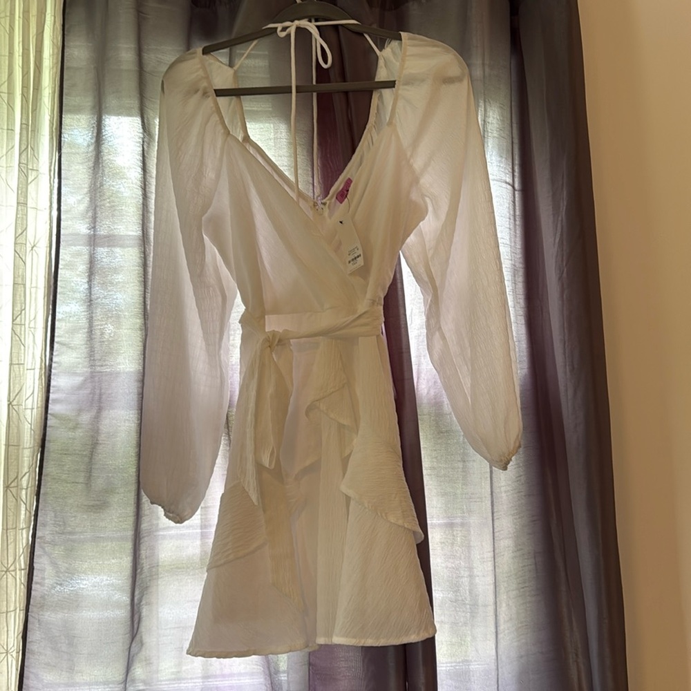 Mi Ami white dress perfect for summer cocktails and date night.